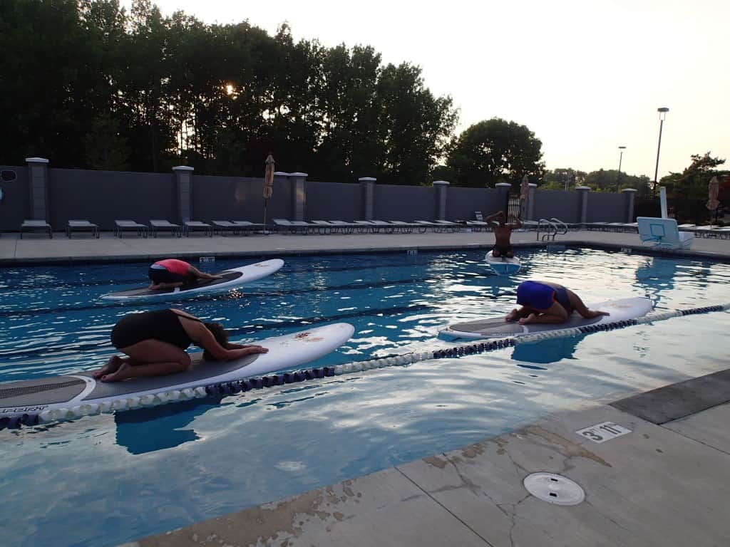 Stand Up Paddle Board Yoga at Elite Sports Clubs